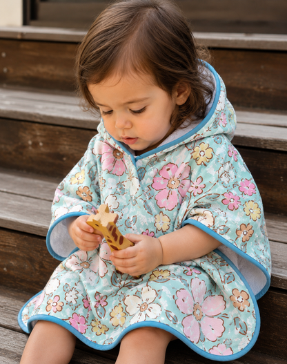 PONCHO DE PLAGE FLORAL PASTEL